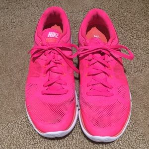 Nike bright pink Flex tennis shoes.  Size 8